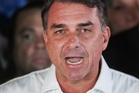 Trump calls Bolsonaro family ‘fine people’ as defeated Brazil candidate flees to US