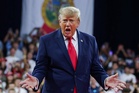 Trump baselessly blames billionaire George Soros after being heckled at rally