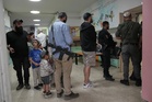 The Latest: Israelis vote in a tense election seen as a referendum on Netanyahu