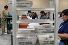 FACT FOCUS: Misinformation about voting spreads less than a week before Election Day