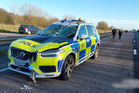 Driver hit with ban after object flies from vehicle into police car's windscreen