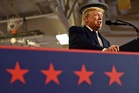 Trump reverses course after reporter calls him out over canceling midterms rallies