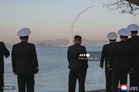 North Korea’s Kim oversees naval cruise missile tests