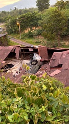 Car plunges onto house roof after skid in Kuala Pilah