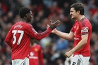 Man Utd beat Liverpool, Spurs climb out of relegation zone