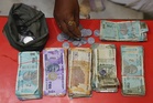 India scrambles to steady rupee as oil shock bites