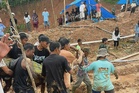 Indonesia mine landslide kills nine