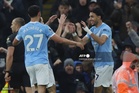 Man City ease past Palace to keep pressure on Arsenal