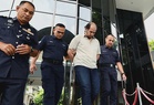 Man charged with trafficking three girls and woman