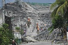 Philippine construction collapse toll hits four, over dozen missing