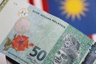 Ringgit opens mixed against major currencies, eases vs US dollar