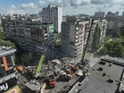 Russia pummels Kyiv, killing three and shattering peace hopes