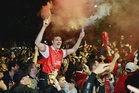 Arsenal players in dawn celebrations after winning Premier League