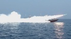 Iran fires warning missiles at US destroyers in Gulf of Oman
