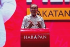 Anwar urges Malaysians to reject racial politics