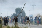 Police, protesters clash in Bolivia at road blockade