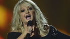Bonnie Tyler wakes from coma after emergency surgery