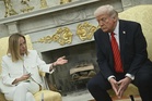 Trump escalates spat with Italy’s Meloni over G7 photo claim