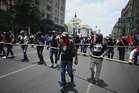 Mexican police tear-gas teachers’ protest 10 days before World Cup