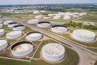 Oil prices slip as markets weigh Mideast and AI risks