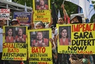 Thousands from Philippine sect protest senator’s graft case