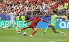 Ronaldo scores twice as Portugal hit five to reach brink of last 32