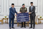 King contributes RM500,000 to Sabah fire victims