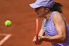 Swiatek exits French Open, Zverev eases into quarters