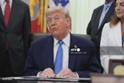 Trump brushes off latest US inflation surge