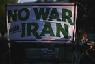 US and Iran agree to pause strikes, meet in Qatar