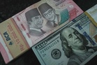 Rupiah falls to record low past 18,000 against US dollar