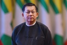 Myanmar leader to visit Thailand next month, Thai FM says