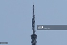 Couple scales Empire State Building in apparent proposal