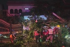 Elderly man rescued after massive heritage tree collapses onto house in George Town