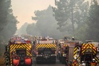 Wildfires send nearly 260,000 fleeing in France and Spain