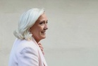 Le Pen vows to fight on for French presidency