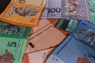 Ringgit ends week marginally higher against US dollar