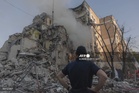Russian strike on Kyiv kills nine as Zelensky warns of attack