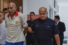 Salesman gets 10 years’ jail, caning for highway cleaver attack