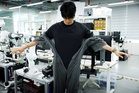 S. Korea-US team unveils robot that dresses people