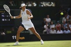 Swiatek sees off Pliskova to race into Wimbledon third round