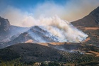 Wildfire rages on Crete as strong winds hamper firefighting