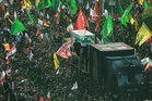 ‘People seek revenge’: Crowds mass in Iran for Khamenei burial