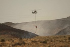 Firefighters gain upper hand on deadly Spain wildfire