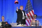 Trump lashes out at media, teases third term at gala