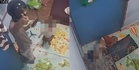 Single father balances ojol deliveries with watching toddler via phone camera