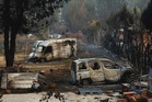 Spanish firefighters battle new blaze near Valencia, 15,000 evacuated