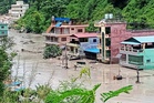 Nepal flash flood washes away villages, damages roads, power projects