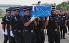 Bodies of three policemen killed in Beaufort flown home