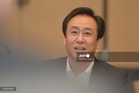 China jails founder, fines disgraced property giant Evergrande